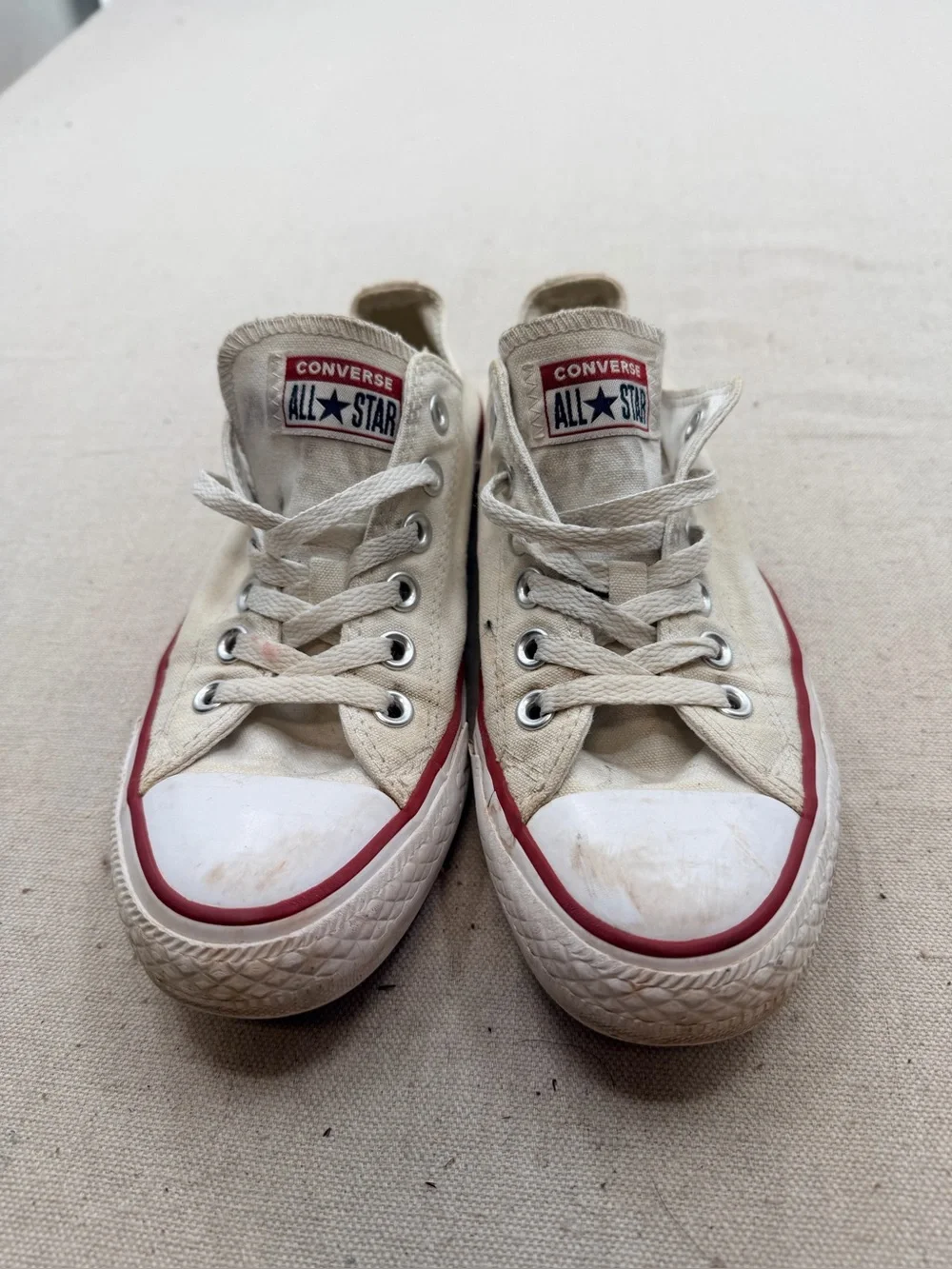 Converse White Low Top Sneakers with Red Trim
